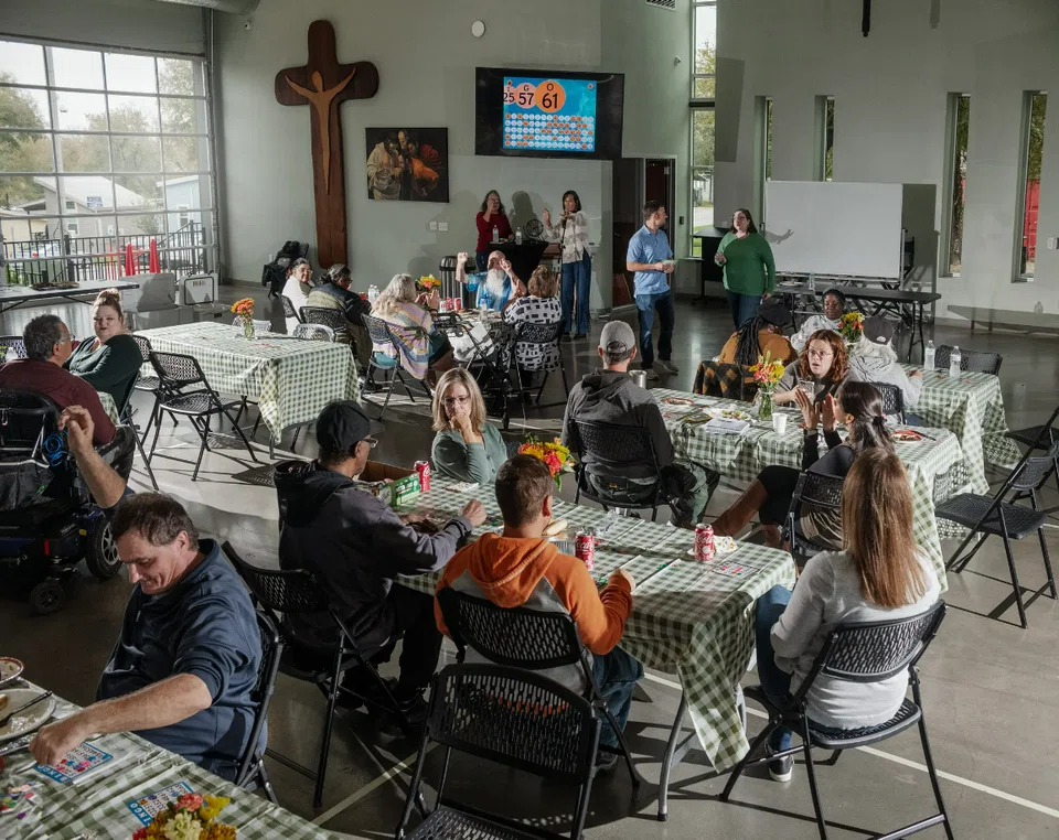 Residents playing bingo at Community First! Village, which aspires to be a model of permanent affordable housing for people who are chronically homeless.