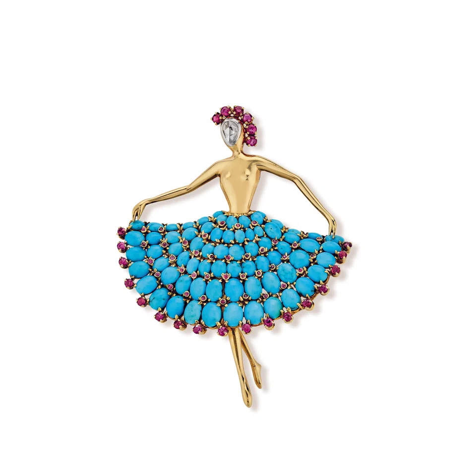 Dancer clip, 1952, in yellow gold and platinum with rubies, turquoise and diamond.
