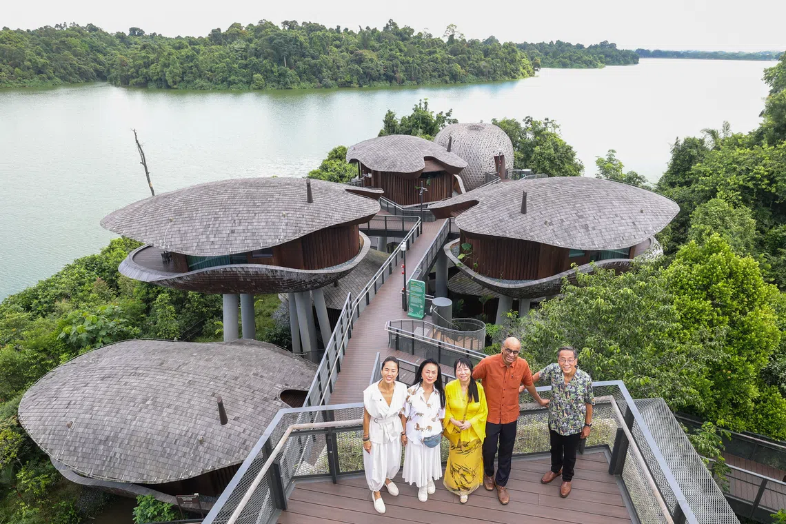From right: Founder and executive chairman of Banyan Group Ho Kwon Ping, President Tharman Shanmugaratnam, his wife Jane Ittogi, co-founder and senior vice-president of Banyan Group Claire Chiang, and Ho Ren Yung, deputy CEO of Banyan Group, at the Mandai Rainforest Resort by Banyan Tree, at the opening of the hotel on Wednesday (Nov 26). 