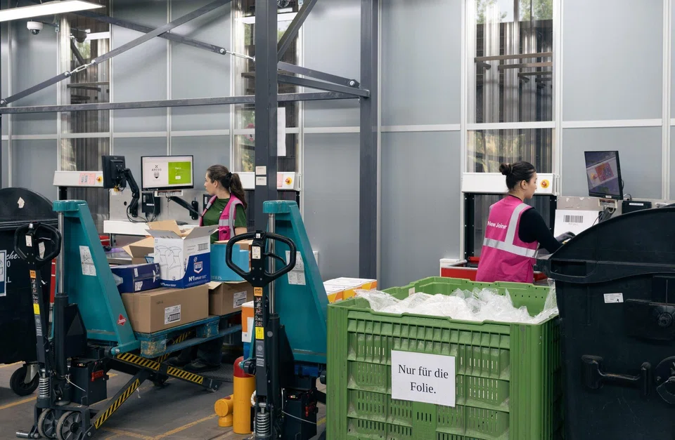 Workers in Austria. While manufacturing declined in both the EU and US, Europe's exports had increased to give new employment opportunities to workers.