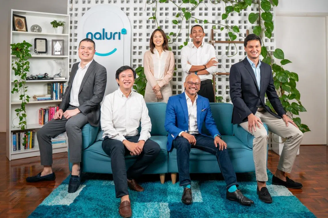 Naluri CEO and co-founder Azran Osman-Rani (front row, second from right) and the management team.