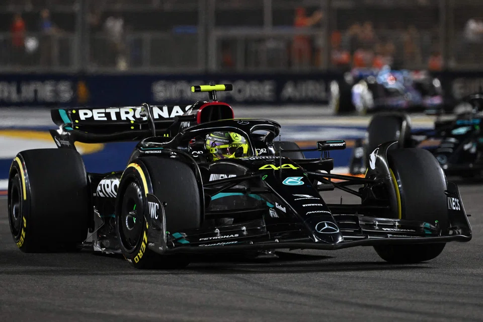 Mercedes' British driver Lewis Hamilton drives during the Singapore Formula One Grand Prix night race at the Marina Bay Street Circuit in Singapore on Sep 17, 2023. 