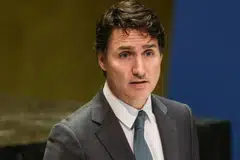 PM Justin Trudeau urged Canadians to buy locally-made products and skip US vacations..