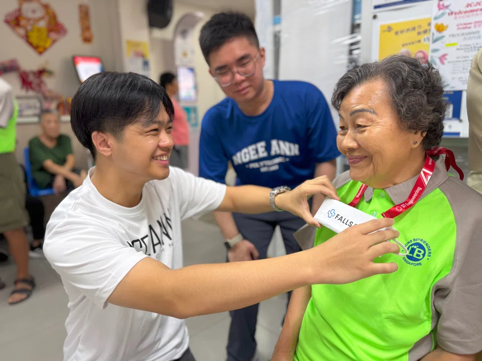 Jeffrey Lee (left), who is part of the team behind FallSafe, says the app aims to provide seniors with “personalised, tailored feedback on how they can improve or maintain their current fall risk”.