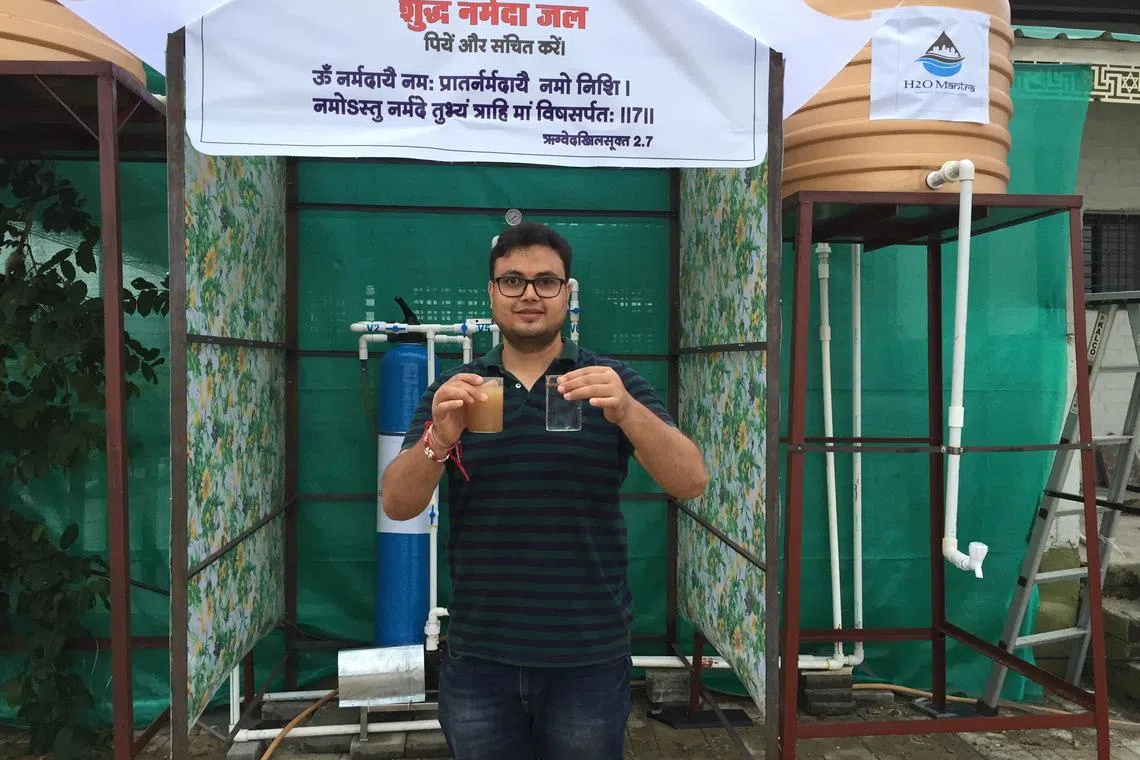 Environsens chief executive Shailesh Kharkwal shows off his company's water filtration capabilities. Networking opportunities from consortium leaders have allowed Environsens to pitch its solutions to state governments.