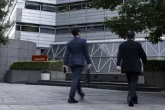 The firm's board is said to be opposed to the proposal that seeks to change its name to Nomura Securities Group.