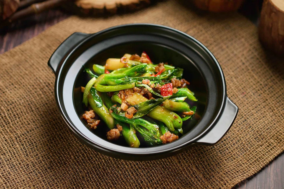 Stir-fried kailan with salted fish is as homey as you can get.