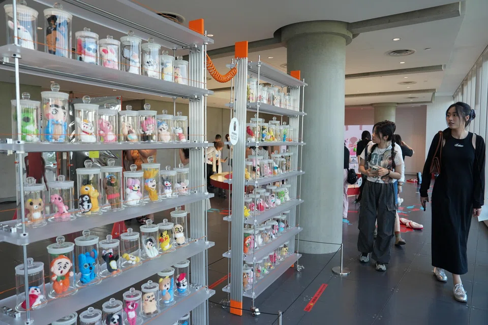 People visit the exhibition 'Era of Uglies Has Arrived' by Alibaba's Taobao, Hangzhou, China, August 13, 2025.