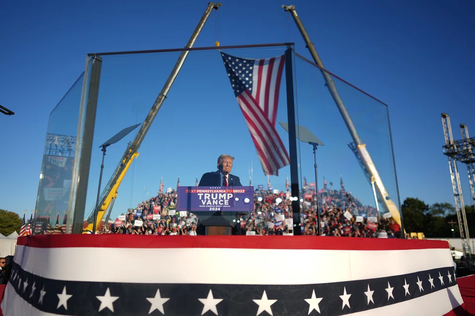 Former US President Donald Trump speaks at a campaign rally in Butler, Pennsylvania, Oct 5, 2024. On Saturday, Trump returned to the site where he was shot in the ear. 