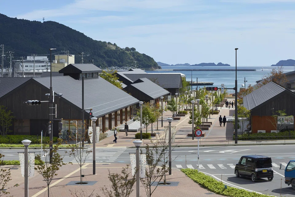 The gable-roofed buildings of Sepal-Pier Onagawa and Hama Terrace.