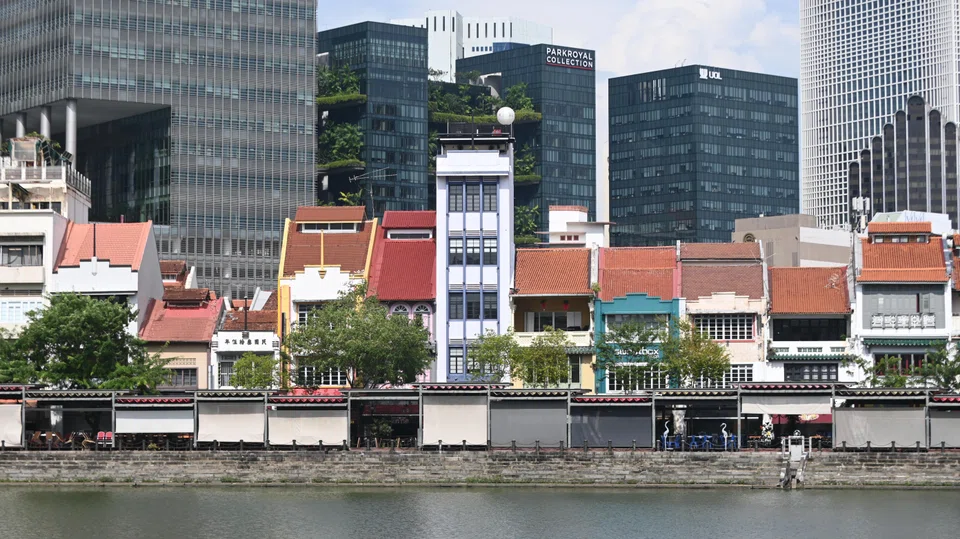 The six-storey property at 52 Boat Quay is the tallest conservation shophouse along the Singapore River.
