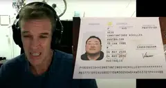 Former Wall Street Journal journalist Tom Wright in a screenshot from a livestream by Project Brazen, showing  an image of what is allegedly Jho Low's passport. The image, which came from a tip-off, suggests that Low is using the alias "Constantinos Achilles Veis" and a forged Australian passport.