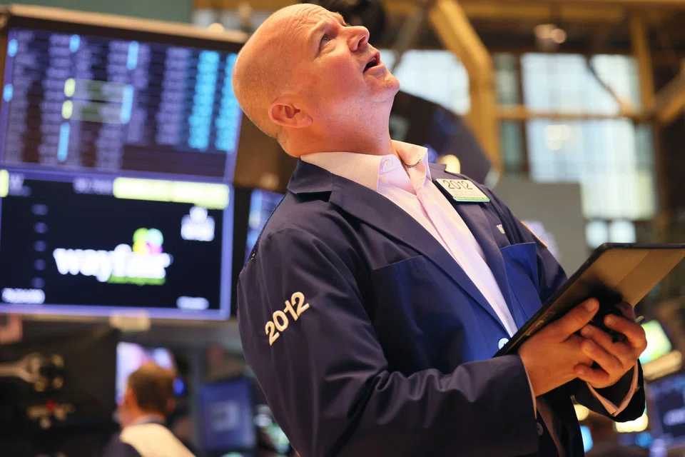 THE S&P 500 and Dow opened lower on Tuesday as soaring oil prices and hawkish comments from a Federal Reserve official spooked investors.
