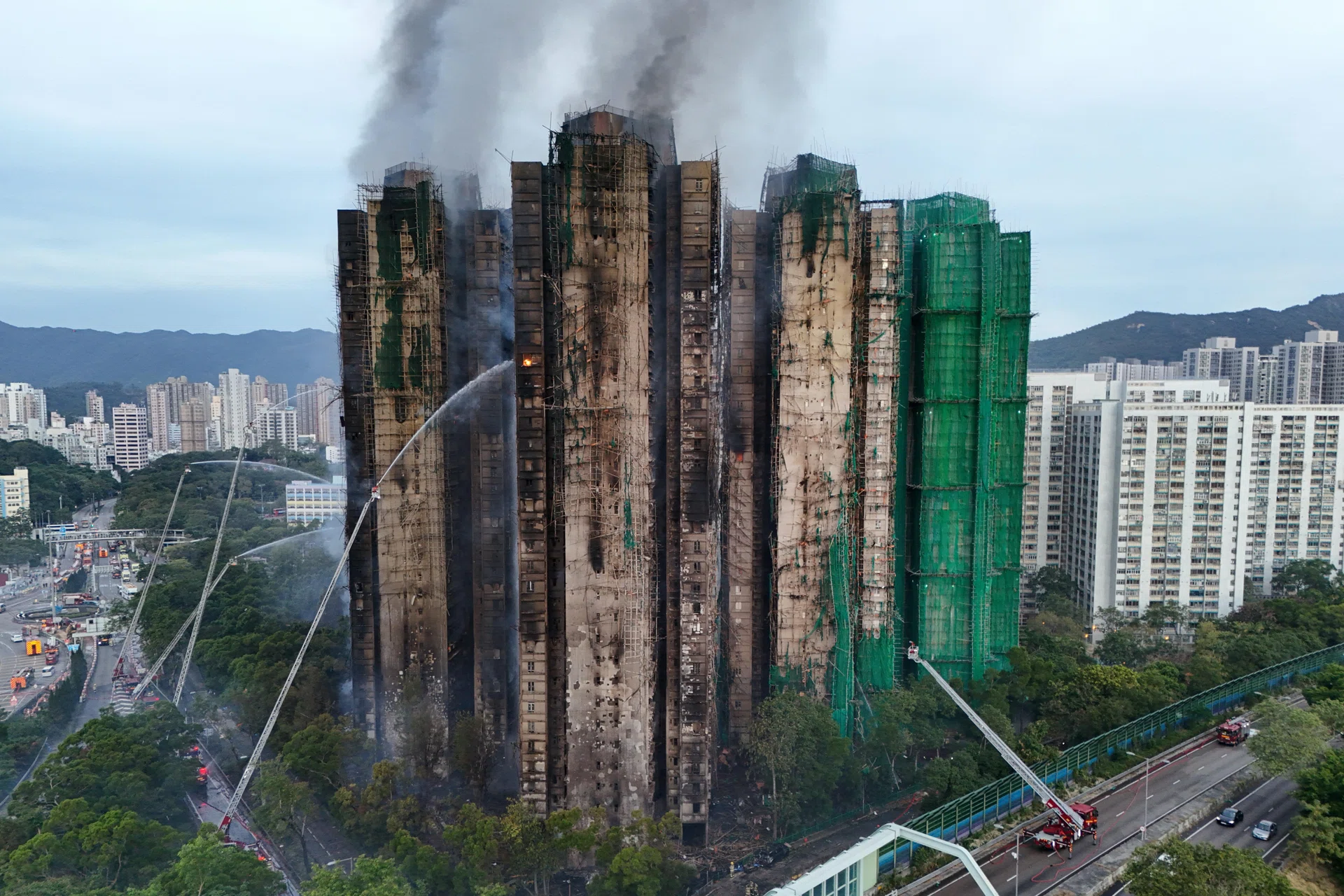 Hong Kong police arrest construction firm bosses over fire; death toll ...