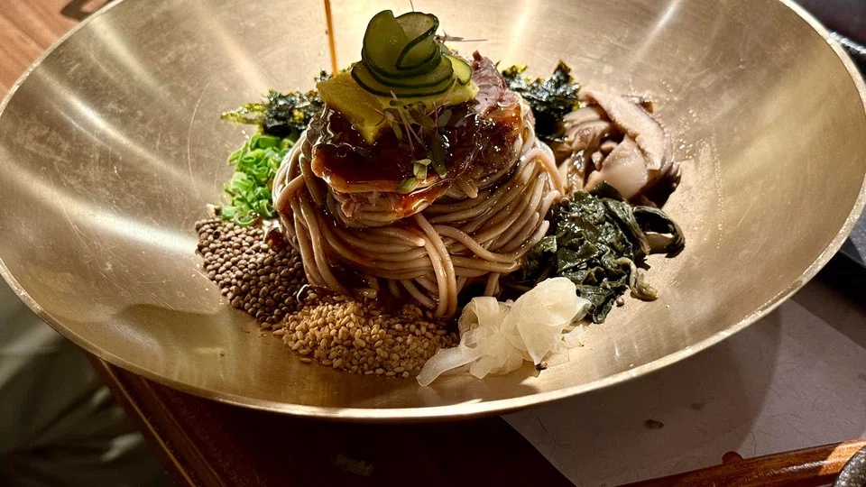 Cold noodles tossed in perilla oil.