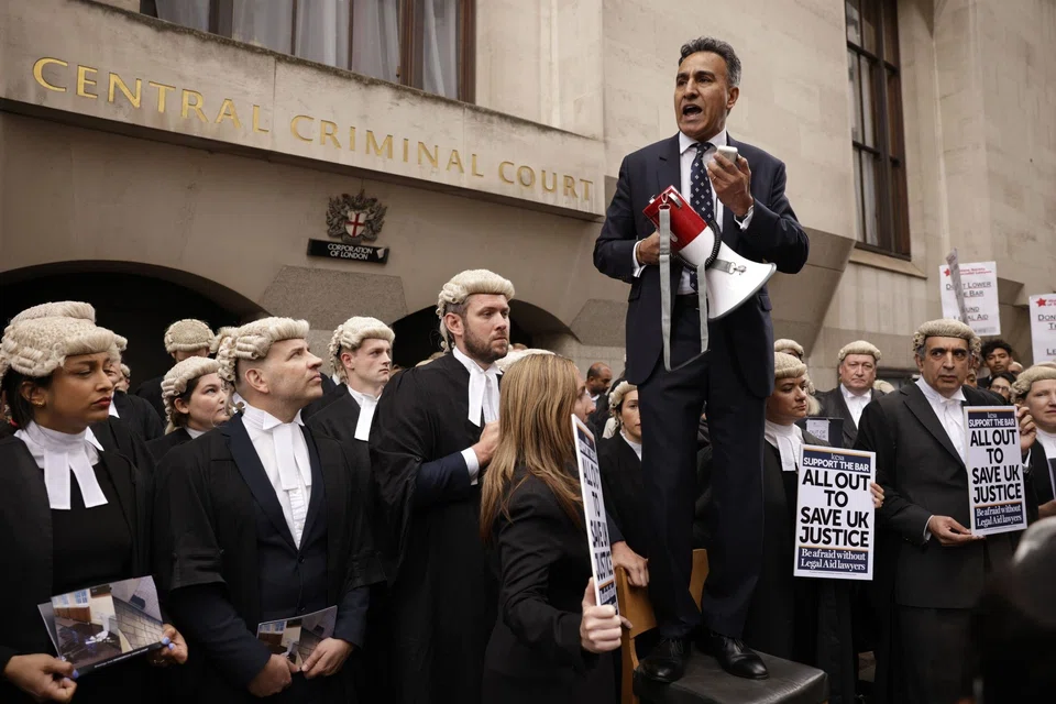 Jo Sidhu, barrister, speaks during a protest by criminal lawyers outside the Old Bailey law courts in central London, UK, on Monday, June 27, 2022. 