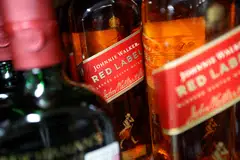 Diageo is trying to come up with ways of cushioning the impact of consumers buying less expensive drinks.
