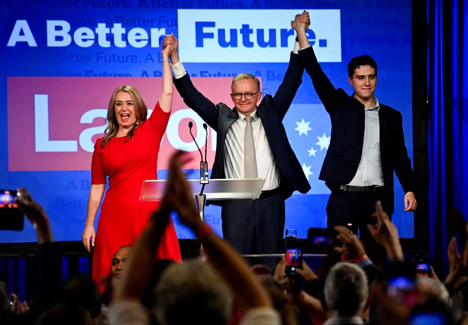 FILE PHOTO: Anthony Albanese, leader of Australia's Labor Party is accompanied by his partner Jodie Haydon and son Nathan Albanese while he addresses his supporters after incumbent Prime Minister and Liberal Party leader Scott Morrison conceded defeat in the country's general election, in Sydney, Australia May 21, 2022. REUTERS/Jaimi Joy/File Photo