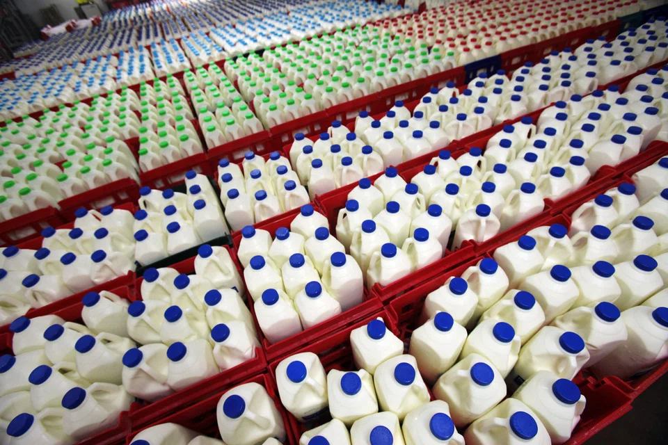 Milk bottles in crates at a Fonterra factory in Takanini, South Auckland, New Zealand.