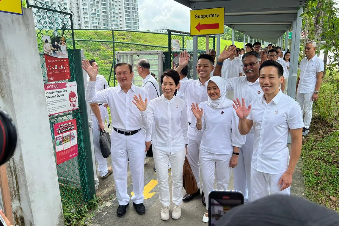 PAP's Grace Fu with the party's Jurong East-Bukit Batok GRC candidates. 