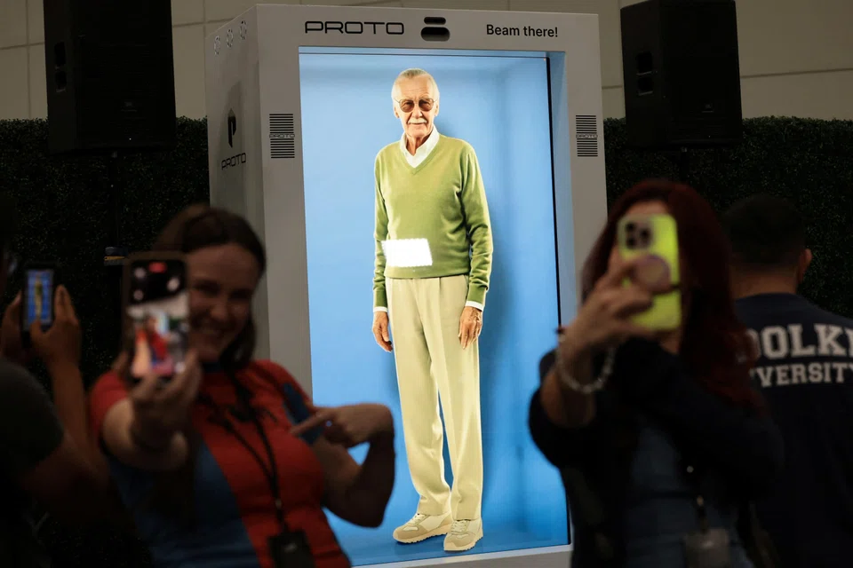 Fans can interact with a hologram of Stan Lee in an enclosed booth at the Los Angeles Convention Center.
