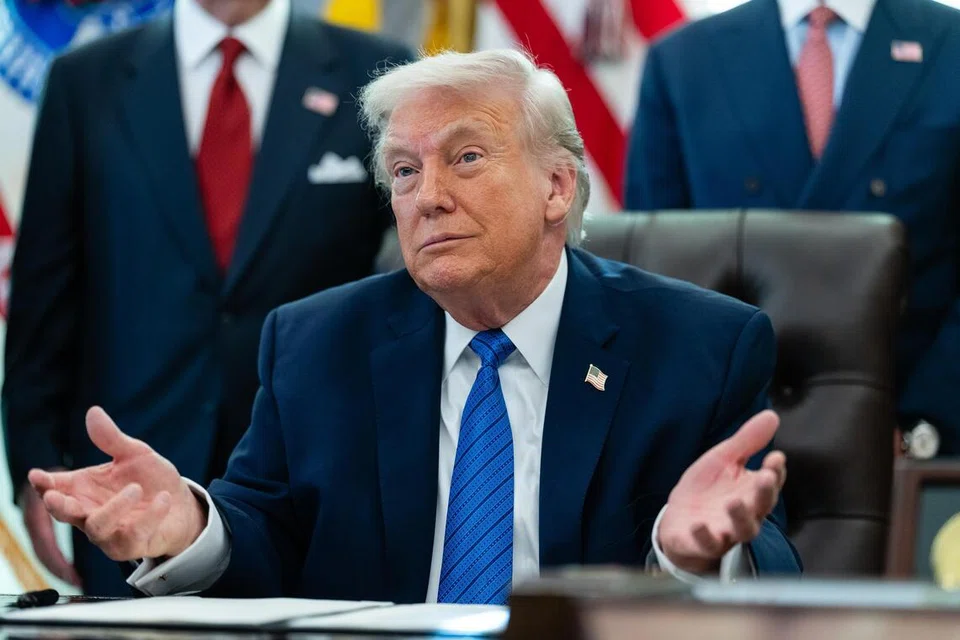 President Donald Trump gestures during a ceremony where he signed an executive order in the Oval Office of the White House in Washington, Jan. 30, 2026. The Justice Department looked into sexual misconduct allegations against President Trump in connection with the sex offender Jeffrey Epstein but did not find credible information to merit further investigation, Todd Blanche, the deputy attorney general, said on Sunday. (Eric Lee/The New York Times)