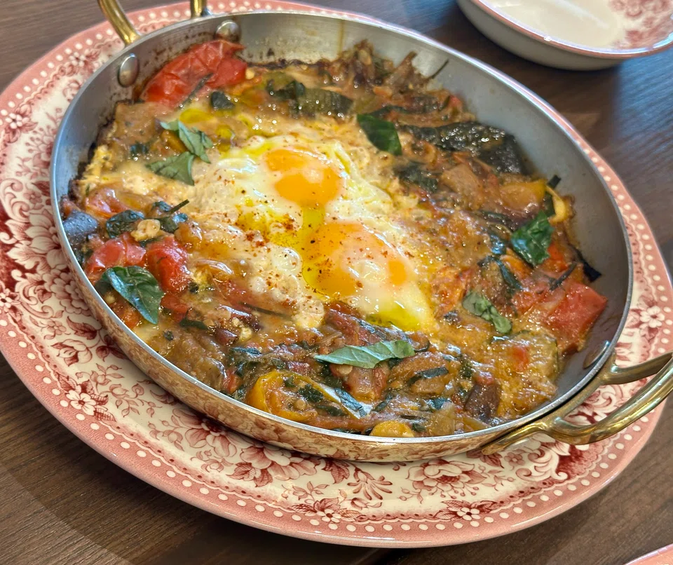 Ratatouille and soft-cooked eggs.