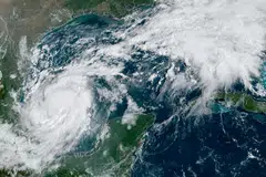 A satellite image shows Tropical Storm Milton intensifying and on track to become a hurricane before its expected landfall in Florida, in the Gulf of Mexico, Oct 6, 2024.    