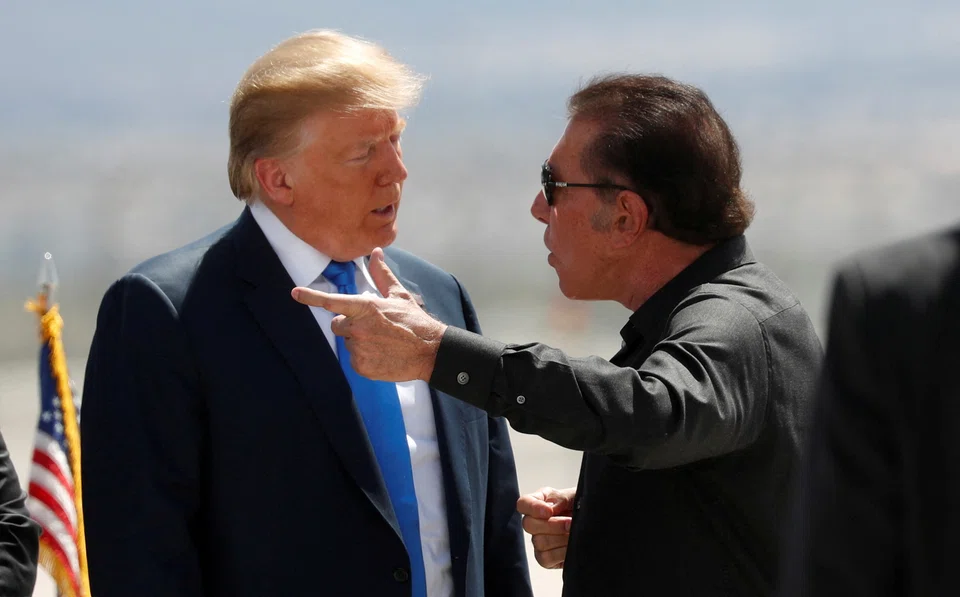 The US Justice Department on Tuesday sued Steve Wynn (right), the former CEO of Wynn Resorts, to compel him to register as an agent of China and accused him of lobbying then-President Donald Trump (left) at Beijing’s behest in 2017.