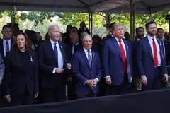 (From left) Democratic presidential nominee and Vice-President Kamala Harris, US President Joe Biden, former New York Mayor Michael Bloomberg, Republican presidential nominee and former US President Donald Trump and Republican US vice-presidential nominee Senator JD Vance  stand on the day of a ceremony marking the 23rd anniversary of the September 11, 2001 attacks on the World Trade Center at the 9/11 Memorial and Museum in the Manhattan borough of New York City.