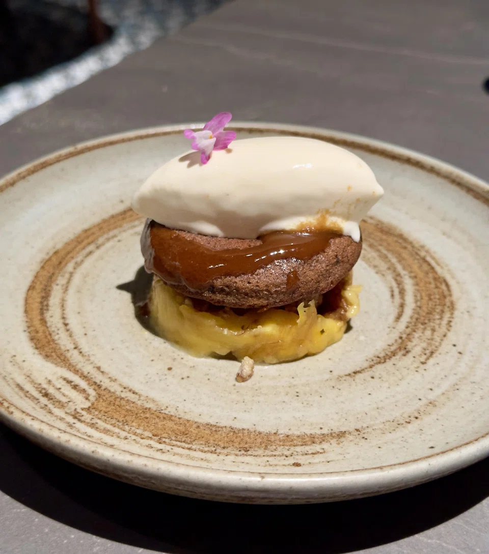 Dessert of sweet mashed plantains, sponge cake and burrata ice cream.
