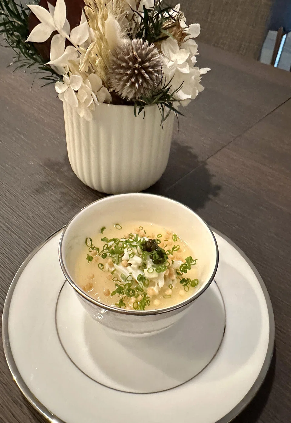 Silky smooth chawanmushi is topped with crabmeat and crispy rice puffs.