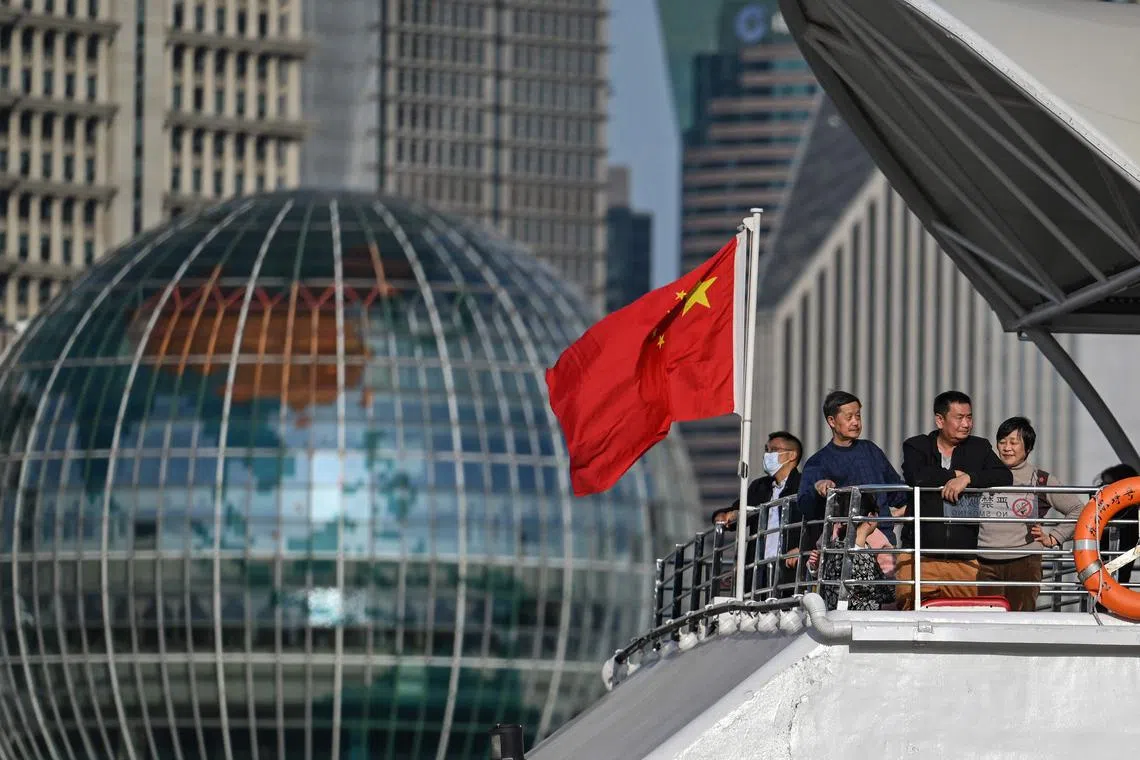 Passengers on a tour ship on the Huangpu river in Shanghai. Tourism is one of the areas of collaboration under the 15 agreements signed at the fourth Singapore-Shanghai Comprehensive Cooperation Council meeting.