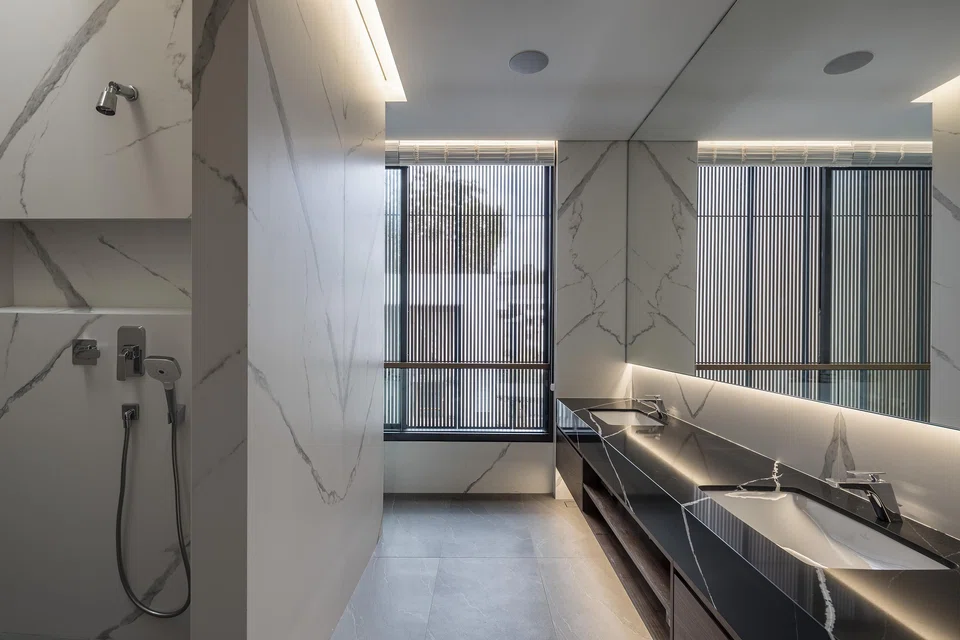 The master bathroom has a simple, clean palette.