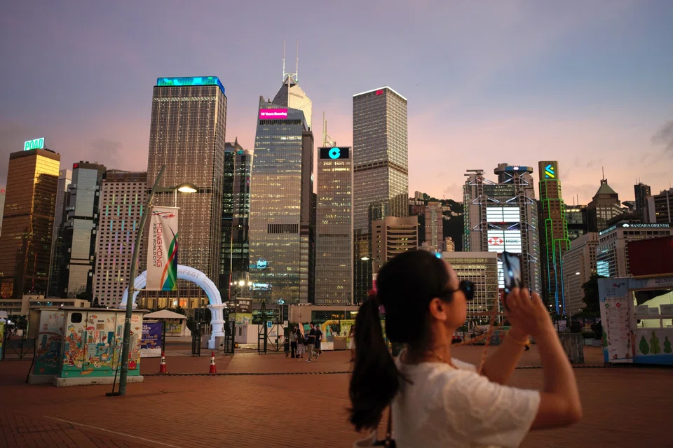 Hong Kong’s banks are coming under increasing pressure to offload loans backed by real estate assets after rolling them over or amending the original terms in the past to avoid writedowns.