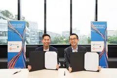 WhiteCoat founder and CEO Bryan Koh (left) and Good Doctor CEO Danu Wicaksana at the signing ceremony. Koh says the company will seek funding "at the right time" to fuel its next phase of growth.