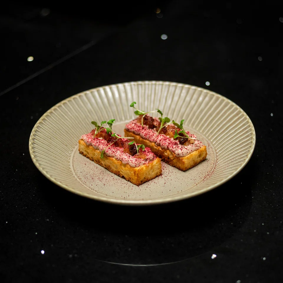 Crispy, toasted brioche is topped with creamy chicken liver mousse.