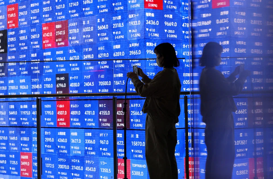 The Nikkei fell 6.3 per cent to 52,091.74 as of 0033 GMT on Monday. 