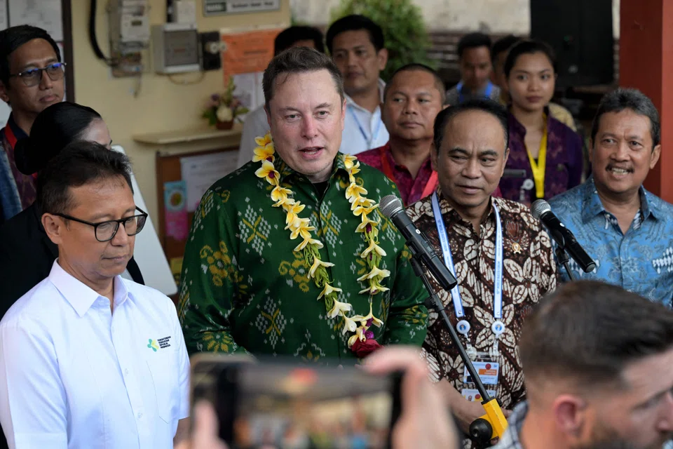 Harnessing solar energy could make the desalination process more economical and effective, says tech billionaire Elon Musk (in green), seen here during his recent trip to Bali.