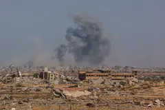 Smoke billows following an Israeli strike in Gaza City, on Oct 2, 2025, as pictured from Nuseirat in central Gaza.