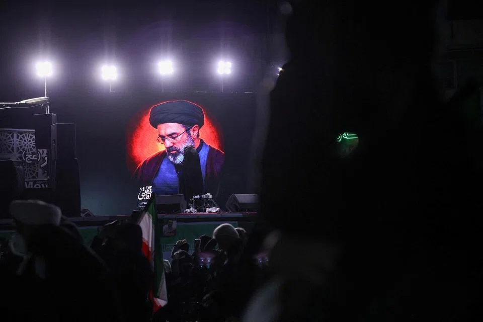 A picture of Iran's new supreme leader, Mojtaba Khamenei, is displayed on a screen in Tehran, amid the U.S.-Israeli conflict with Iran, in Tehran, Iran, March 9, 2026. Majid Asgaripour/WANA (West Asia News Agency) via REUTERS ATTENTION EDITORS - THIS PICTURE WAS PROVIDED BY A THIRD PARTY     TPX IMAGES OF THE DAY     