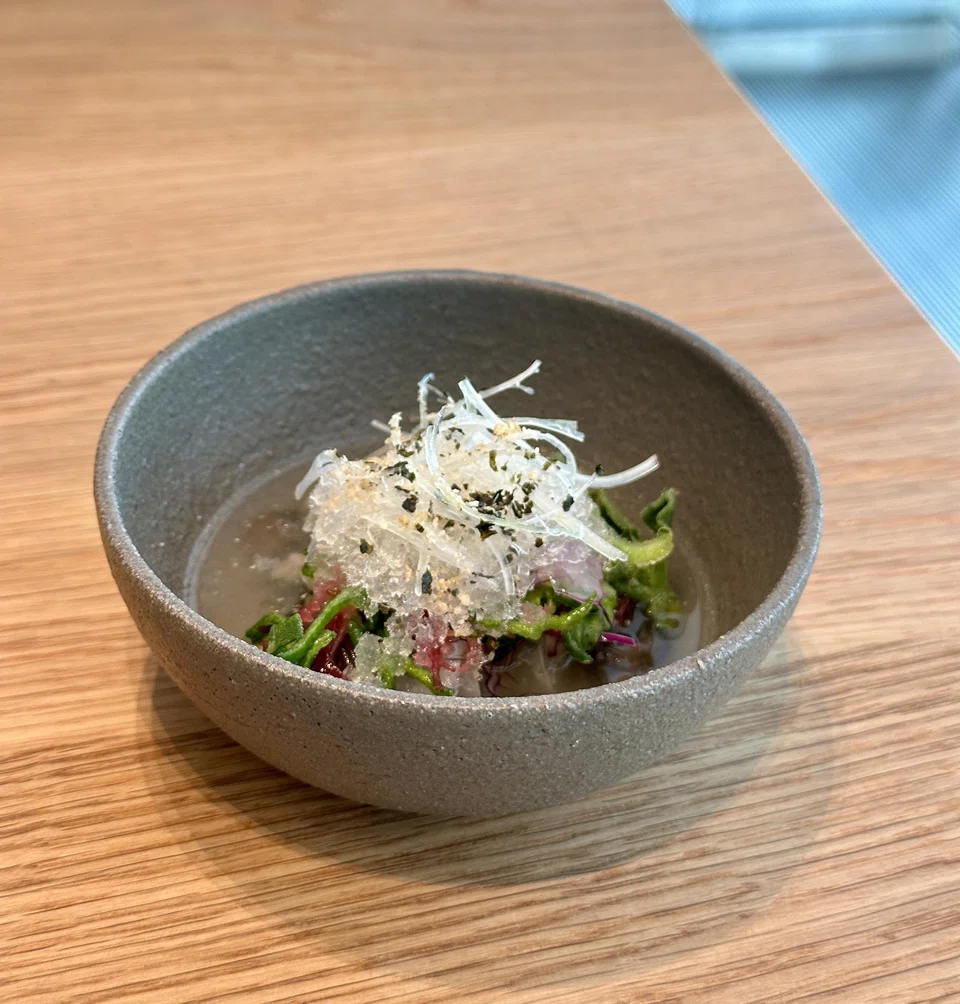 Mulhwe features raw fish in an icy kimchi broth.