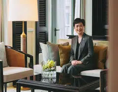 RWS CEO Lee Shi Ruh in one of the suites at The Laurus hotel, which opened in 2025. The IR will open two new hotels with a total of 700 rooms in 2030.