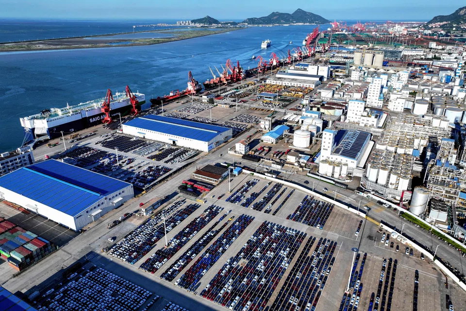 Cars for export wait to be loaded on a ship at a port in Lianyungang, in eastern China's Jiangsu province, July 29, 2024.