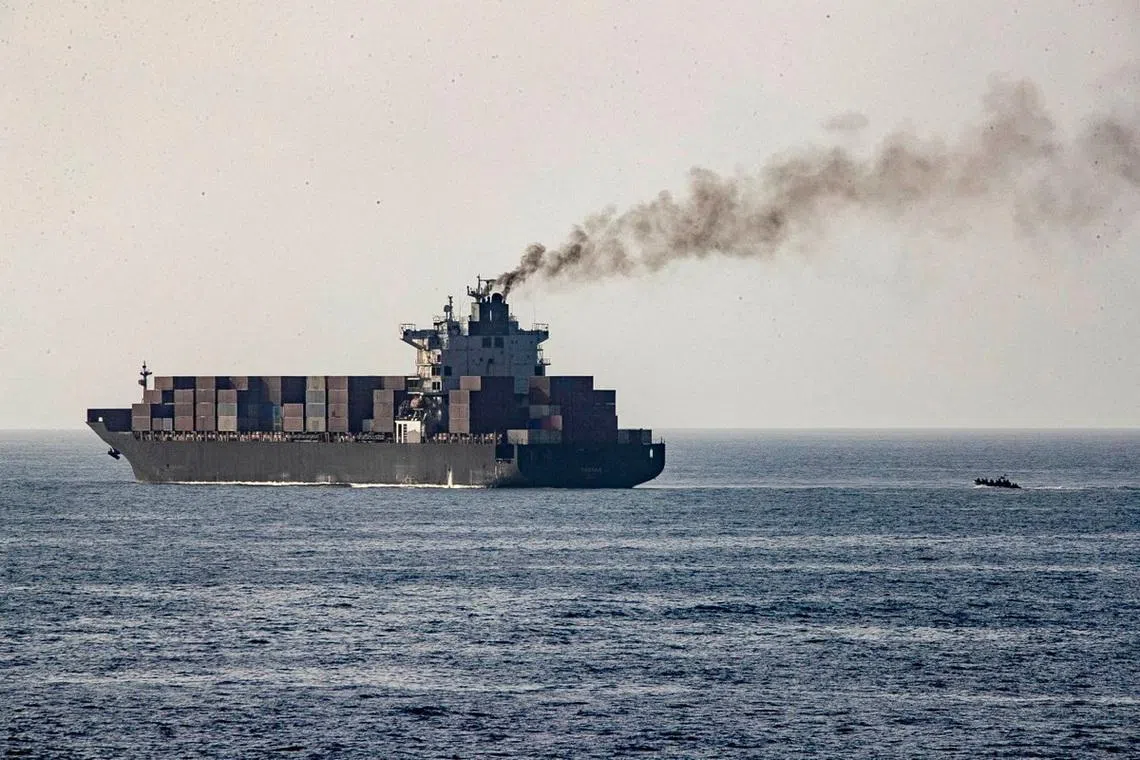 US forces patrol near the Iranian-flagged ship after it was boarded and seized by the US on Sunday. Trump said he is unlikely to extend the truce with Iran if no agreement is reached before its expiry.