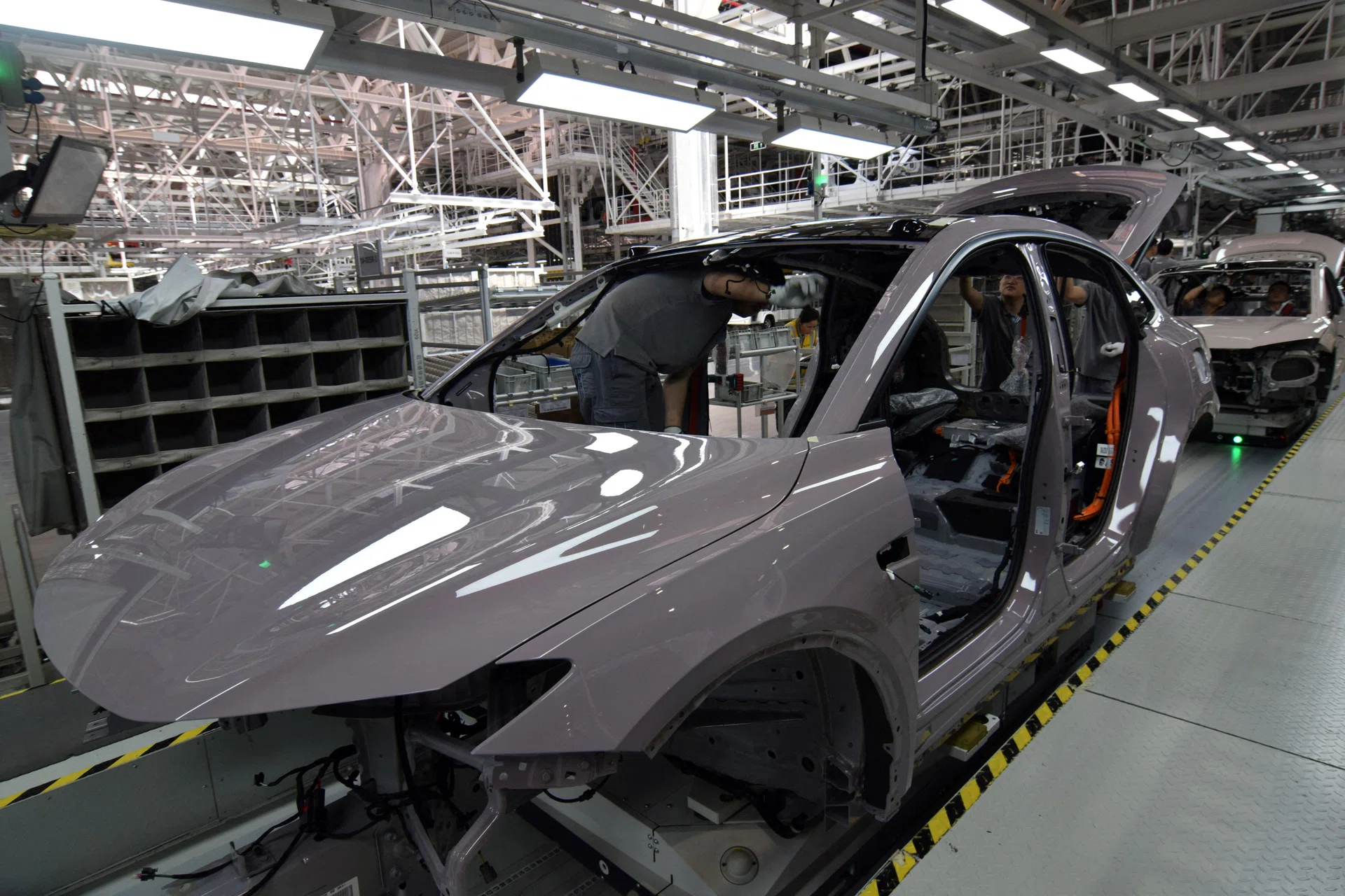 China bans below-cost car sales to end prolonged price war