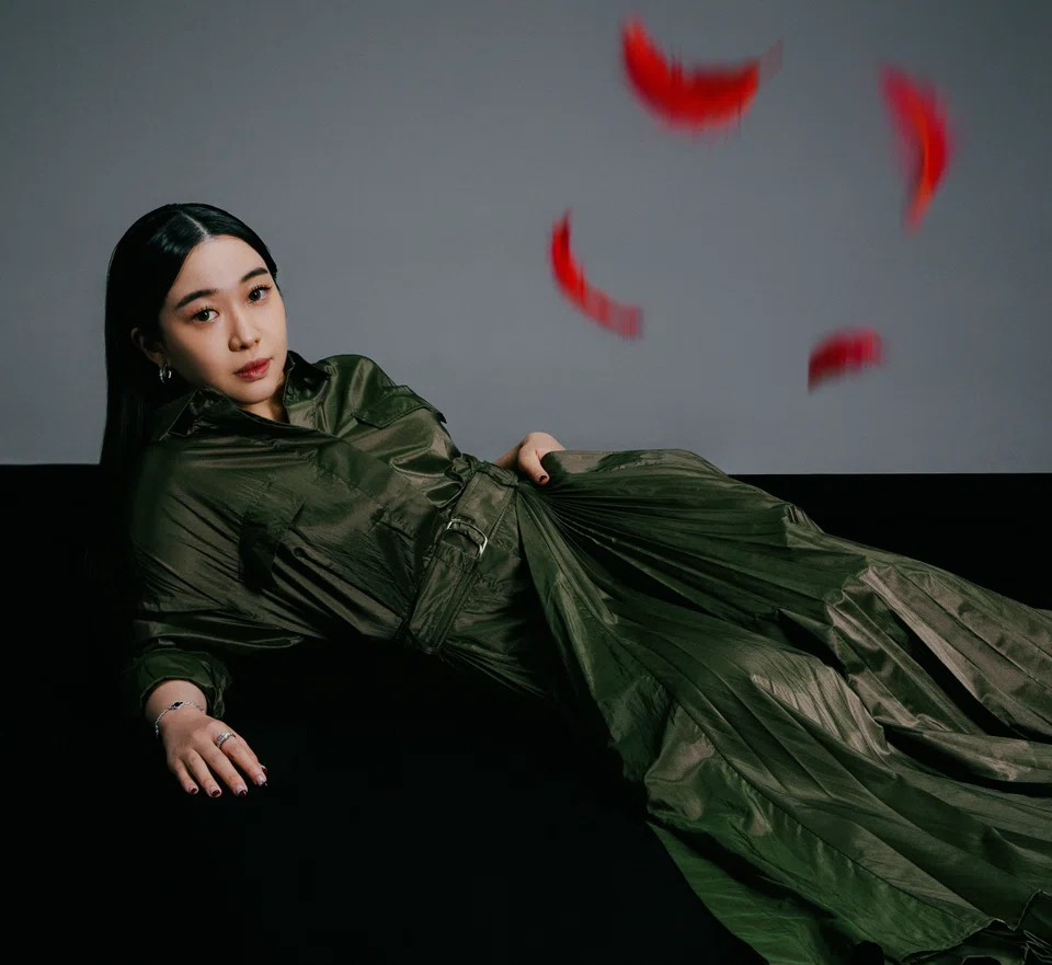 Kara Arissa Tan wears a shirt dress by Max Mara. (Styling by Violet Foo; hair and make-up by Alison Tay.)