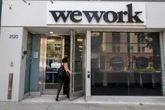 WeWork says its restructuring cuts its future rent obligations in half, or about US$12 billion overall.