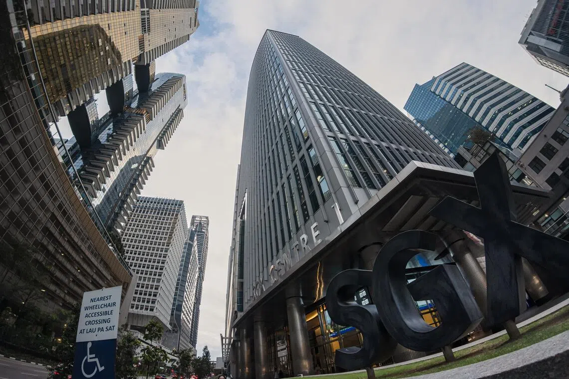 The STI is down 14.39 points at 4,958.01, while the iEdge Singapore Next 50 Index falls 0.93 point to 1,466.43.