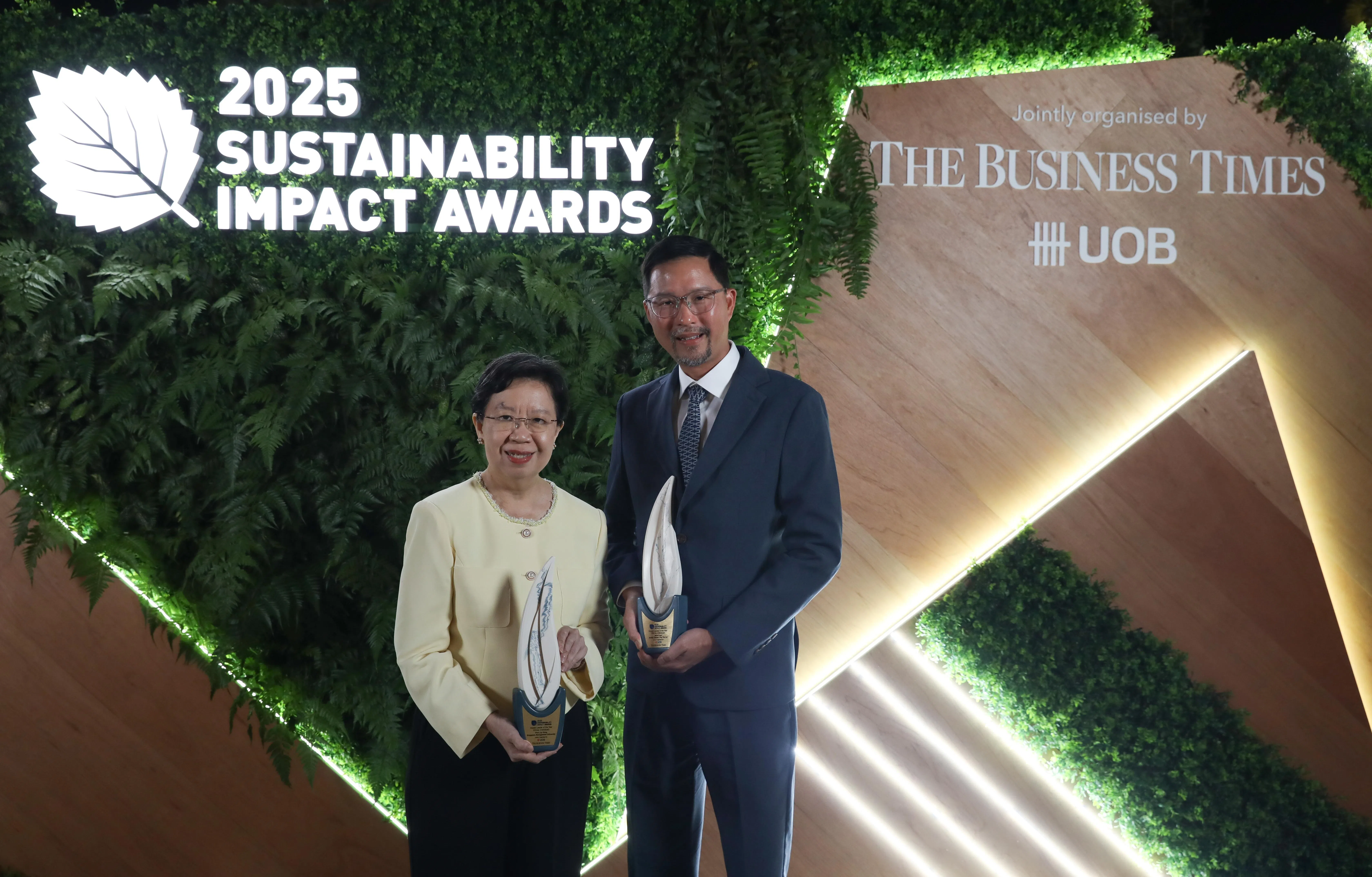 Professor Lily Kong (left), president of SMU, and Bjorn Low, co-founder of Edible Garden City, have been named Impact Leaders of the Year.